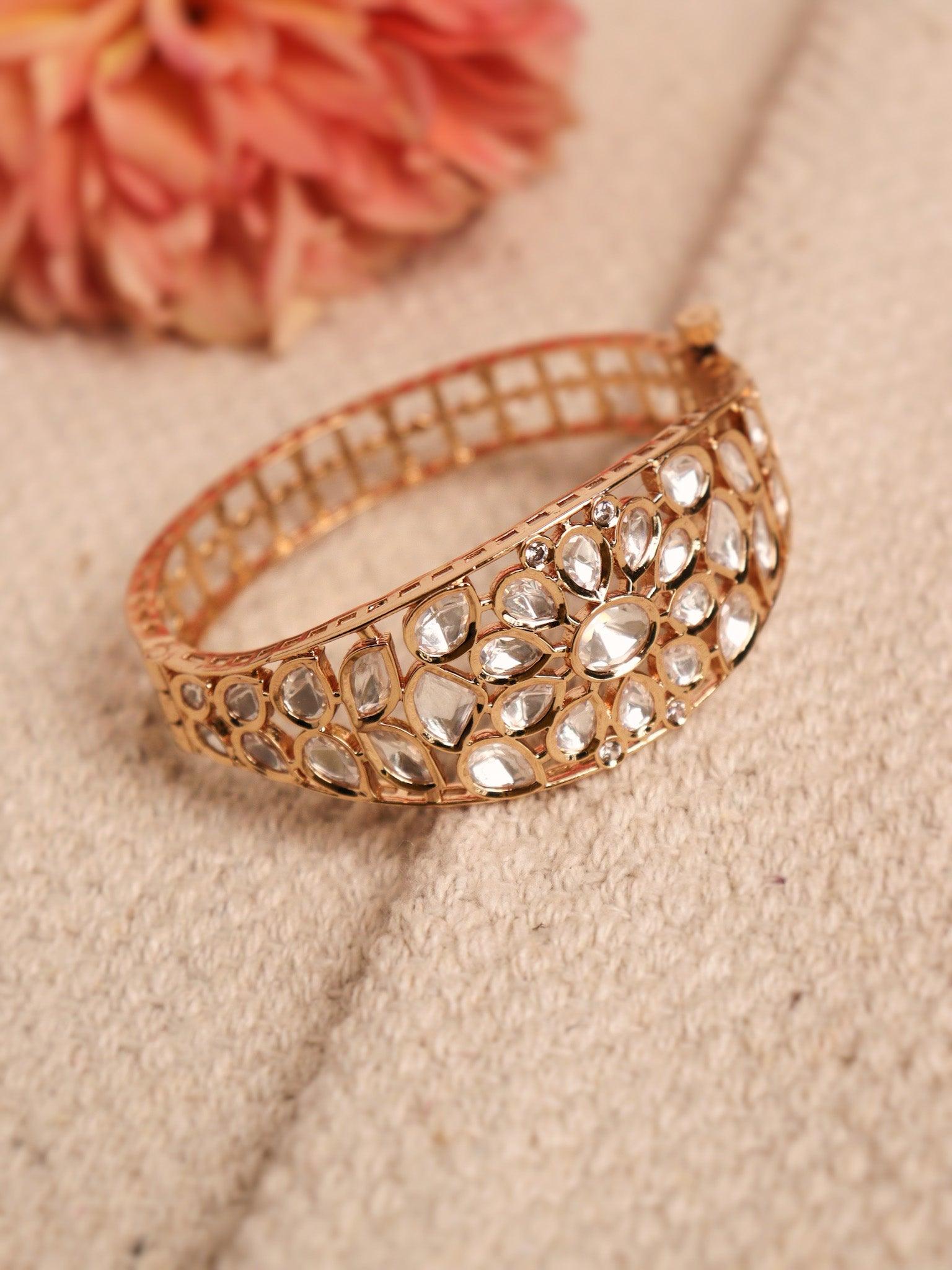 Magnificent Kundan Embellished Gold toned Bangle