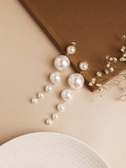 The Pearl Story - Pearly White Shoulder Duster Earrings